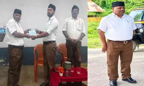 Former Devikulam MLA S Rajendran in RSS Ganavesh attending Vijayadashami program in Munnar