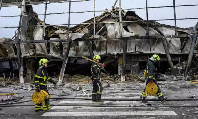 Smoke rising over Kyiv following Russian missile and drone attacks Smoke rising over Kyiv following Russian missile and drone attacks
