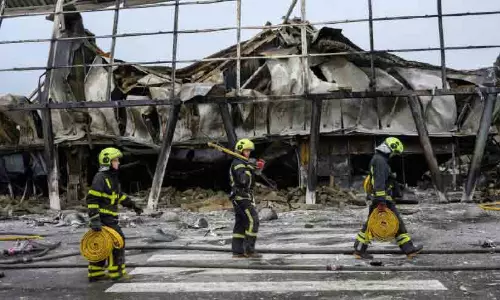 Smoke rising over Kyiv following Russian missile and drone attacks Smoke rising over Kyiv following Russian missile and drone attacks