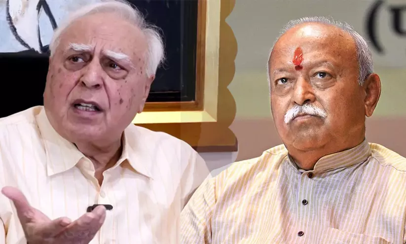 ‘വിദേശങ്ങളിലെ അക്രമസ്വഭാവമുള്ള മുന്നേറ്റങ്ങളെ ഇന്ത്യയിലെ പ്രതിഷേധങ്ങളുമായി താരതമ്യം ചെയ്യാനാകില്ല’; മോഹൻ ഭാഗവതിന്റെ ‘ഭരണമാറ്റ’പരാമർശത്തിന് മറുപടിയുമായി കപിൽ സിബൽ ‘വിദേശങ്ങളിലെ അക്രമസ്വഭാവമുള്ള മുന്നേറ്റങ്ങളെ ഇന്ത്യയിലെ പ്രതിഷേധങ്ങളുമായി താരതമ്യം ചെയ്യാനാകില്ല’; മോഹൻ ഭാഗവതിന്റെ ‘ഭരണമാറ്റ’പരാമർശത്തിന് മറുപടിയുമായി കപിൽ സിബൽ