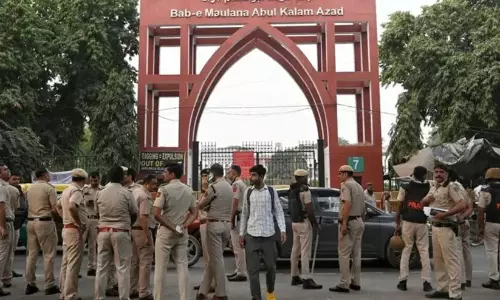 Main entrance and campus of Jamia Millia Islamia in New Delhi where student protests erupted over union elections and posters.