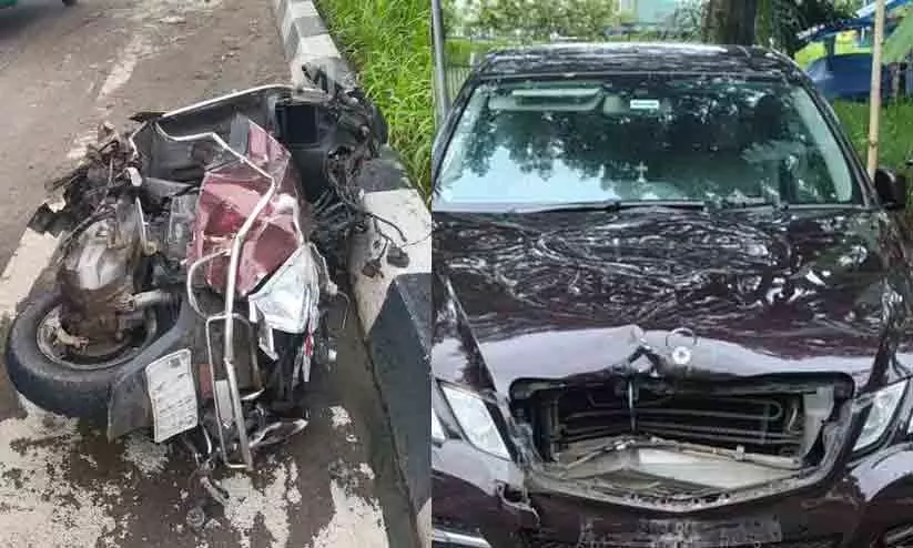 Accident scene in Cheranalloor where a minor driving a Benz car rammed into a scooter killing rider Jayabalakrishnan Accident scene in Cheranalloor where a minor driving a Benz car rammed into a scooter killing rider Jayabalakrishnan