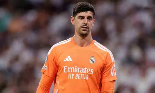 Real Madrid goalkeeper Thibaut Courtois and Barcelona midfielder Dani Olmo who will miss the crucial El Clásico match