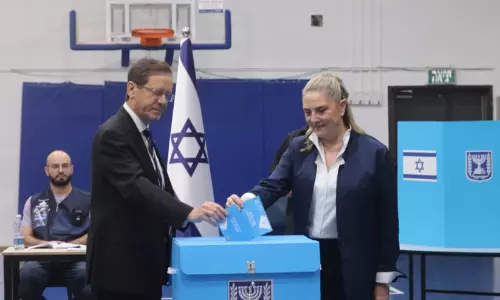 Israeli voters casting their ballots inside a polling station in Jerusalem during the Knesset general election. Israeli voters casting their ballots inside a polling station in Jerusalem during the Knesset general election.