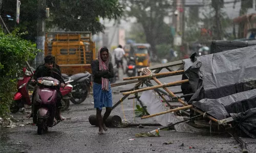 Uprooted trees and waterlogged roads in coastal Andhra Pradesh following the landfall of Cyclone Arnab. Uprooted trees and waterlogged roads in coastal Andhra Pradesh following the landfall of Cyclone Arnab.