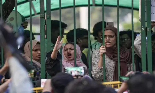 Jamia Millia Islamia students gathered near Gate Number 7 protesting for the restoration of students union elections.