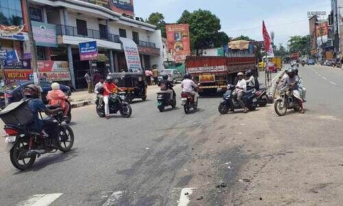 ട്രാഫിക് സിഗ്നലില്ല; കൊടിനടയിൽ അപകടം പതിവ്