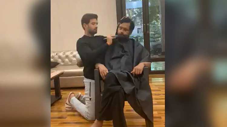 കേന്ദ്രമന്ത്രിയുടെ താടിയും മീശയും വെട്ടി മകൻ