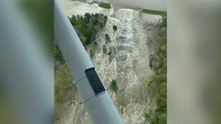 ഡാം തകർന്ന് വെള്ളം കുത്തിയൊലിക്കുന്നതിന്‍റെ ആകാശദൃശ്യം വൈറൽ -Video