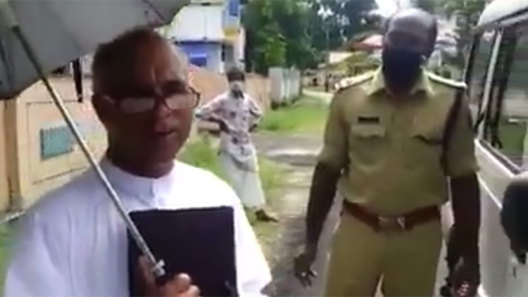 മാസ്​ക്​ ധരിക്കാ​െത കറങ്ങി നടന്ന്​ പുരോഹിതൻ;  പൊലീസ്​ പിടിച്ചപ്പോൾ തന്നെ ദൈവം രക്ഷിക്കുമെന്നും വാദം