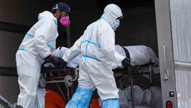 ന്യൂയോർക്കിൽ നൂറോളം മൃതദേഹങ്ങൾ ട്രക്കുകളിൽ കൂട്ടിയിട്ട നിലയിൽ