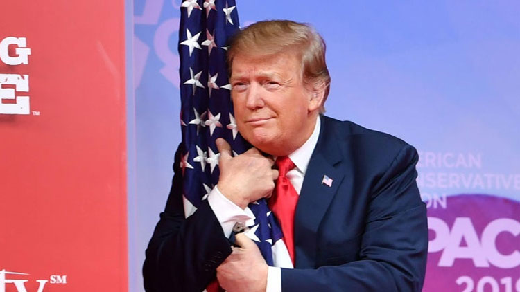 donald-trump-hugs-flag