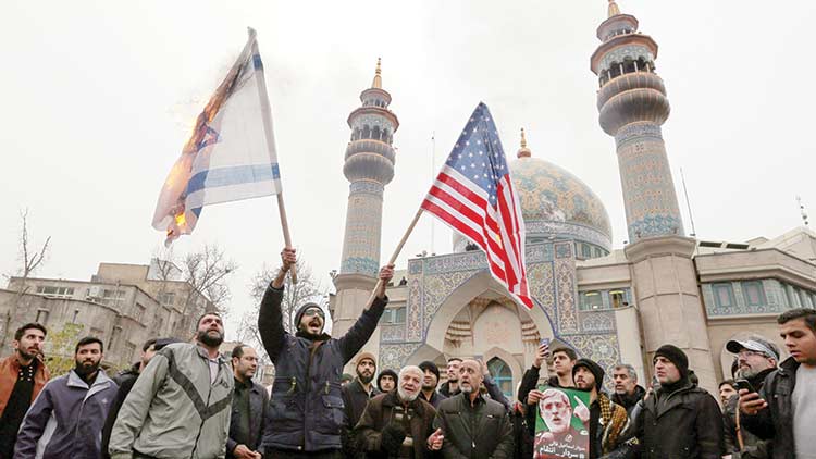 iran-people-set-fire-us-flag.