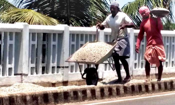 കടുത്ത ചൂടിലും ഇതരദേശ തൊഴിലാളികൾക്ക്​ വിശ്രമമില്ല