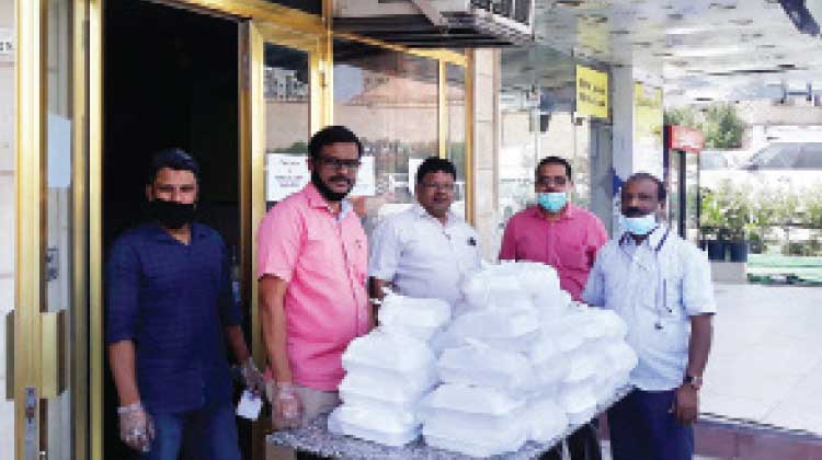 ലോക്‌ ഡൗണിൽ കുടുങ്ങിയവർക്ക്​ ഭക്ഷണ വിതരണം