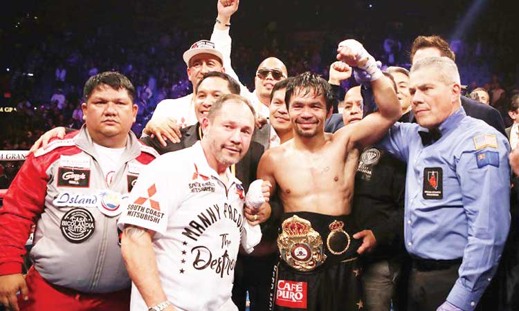 ബോക്​സിങ്​ ലോകകിരീടം നിലനിർത്തി പക്വിയാവോ