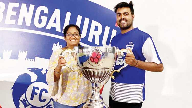 meghana-and-suraj-nair-with-isl-trophy meghana-and-suraj-nair-with-isl-trophy