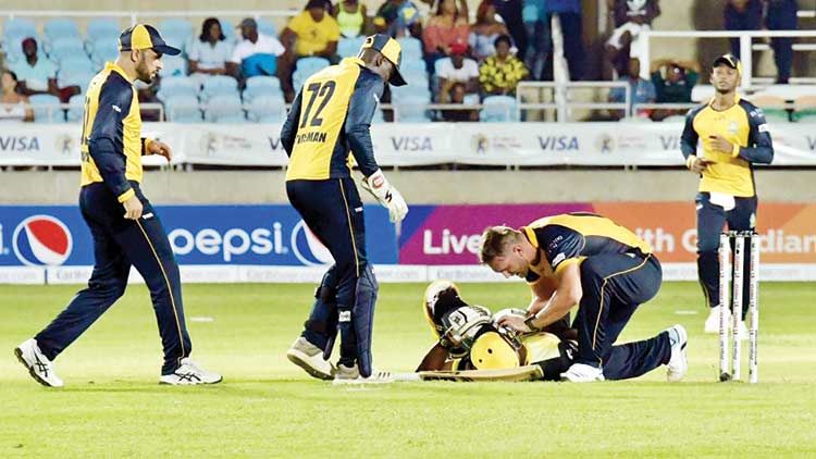 പന്ത്​ കൊണ്ടത്​ തലക്ക്; ഗ്രൗണ്ടിൽ​ വീണ്​ ആന്ദ്രേ റസൽ