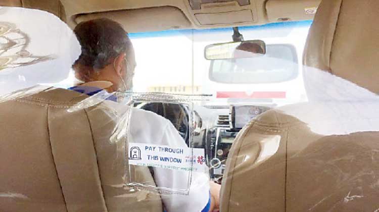 കർവ ടാക്സികളിൽ സംരക്ഷണമേകാൻ ഇനി പ്ലാസ്​റ്റിക് കവചങ്ങളും