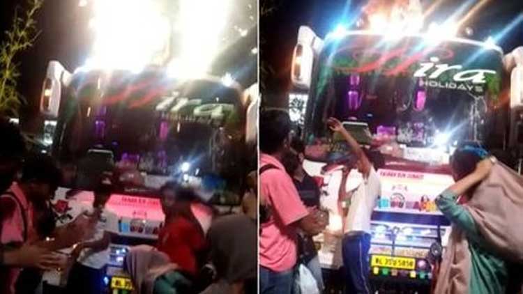 വിനോദയാത്രക്കിടെ ബസിന് മുകളിൽ പൂത്തിരിയും പടക്കവും കത്തിച്ച് ആഘോഷം